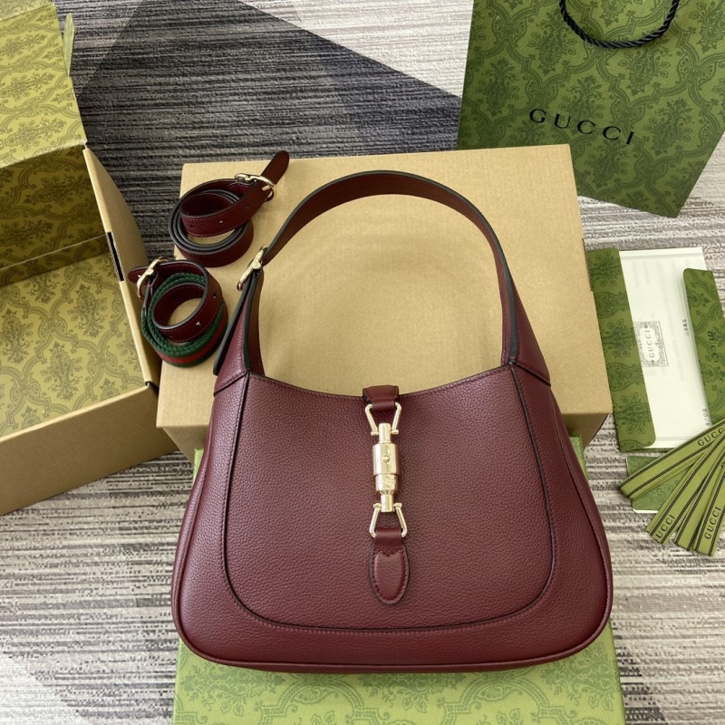 G*u*i top handle bags